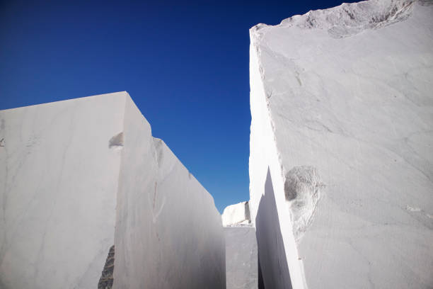 istock Deposit of blocks of statuary white marble 1402470110