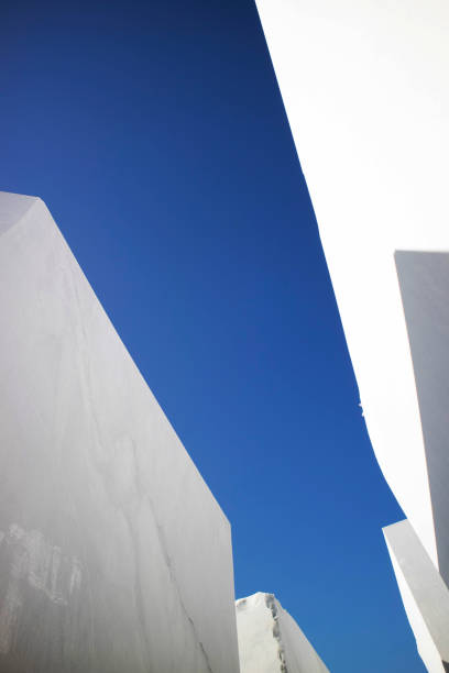 istock Deposit of blocks of statuary white marble 1402470111