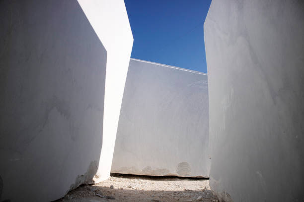 istock Deposit of blocks of statuary white marble 1402470113