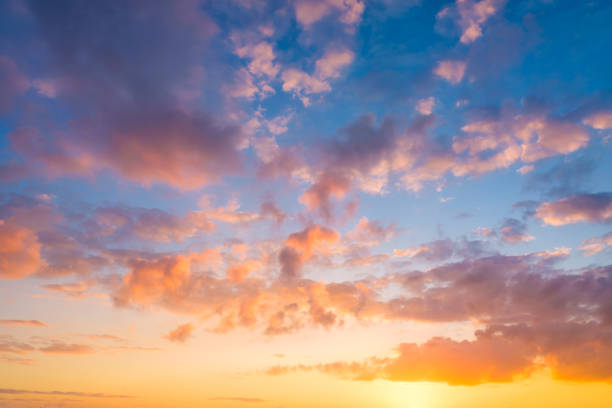 istock Sky with clouds during sunset. Clouds and blue sky. A high-resolution photograph. Panoramic photo for design and background. 1402470296