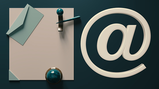 E-mail symbol on desk background with envelope, pen and paper. 3d rendering. Top view