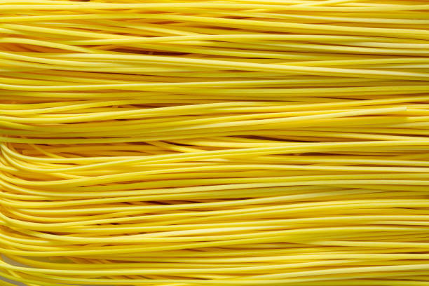 istock Macro Spaghetti,Unprepared spaghetti dry. Macro background. High quality photo 1402473888