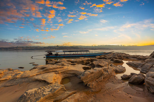 istock Ubon Ratchathani,Sunrise landscape photo with boat, mountain,Sam Phan Bok, Ubon Ratchathani, Thailand 1402474267