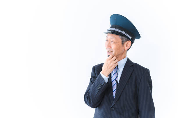 istock Male conductor making an announcement inside the train 1402474361