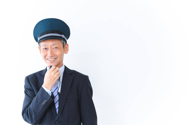 istock Male conductor making an announcement inside the train 1402474362