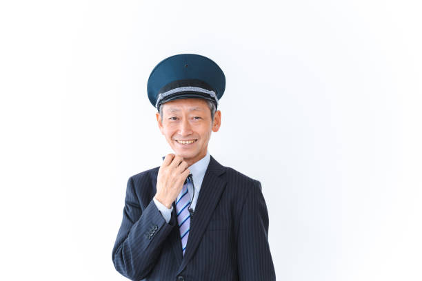 istock Male conductor making an announcement inside the train 1402474367