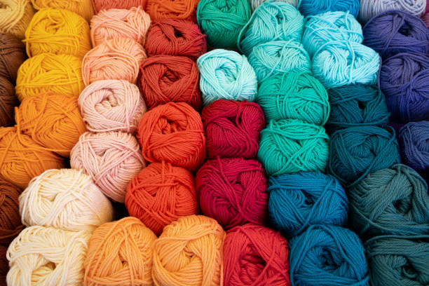 istock Corlorful variation of woolen knitting balls, wool knots, close up full frame 1402479246