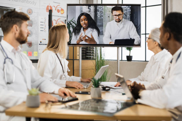 istock Therapists having online session with diverse colleagues 1402479504