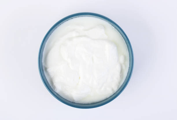 istock Beauty cream in open jar top view 1402484240
