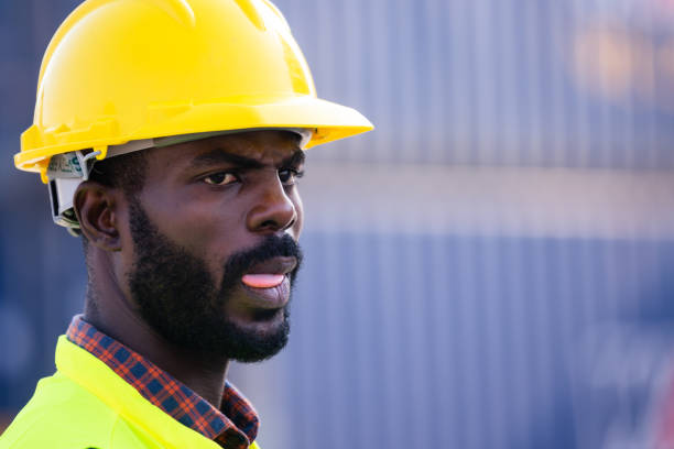 istock African American worker working in containers control station shipment import export 1402485569