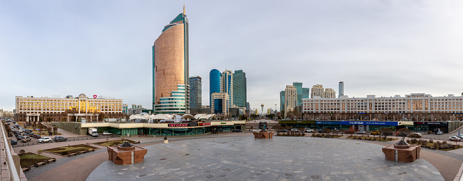 Nur Sultan, Kazakhstan, 11.11.21. Panorama of Nur Sultan city centre Nurzhol Boulevard with Eurasian Bank ERG, Transport Tauer, Ao Nk Ktzh buildings, Bayterek Tower, Qazkom building and restaurans.