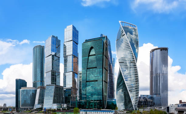 istock Office and residential skyscrapers against blue sky. 1402489962