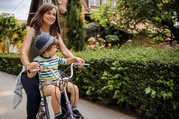 istock Son and mother enjoy the ride 1402494707