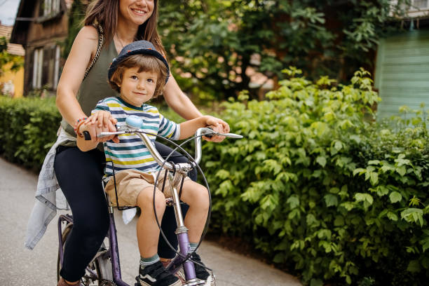 istock Son and mother enjoy the ride 1402494714