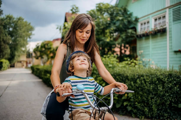 istock Son and mother enjoy the ride 1402494726