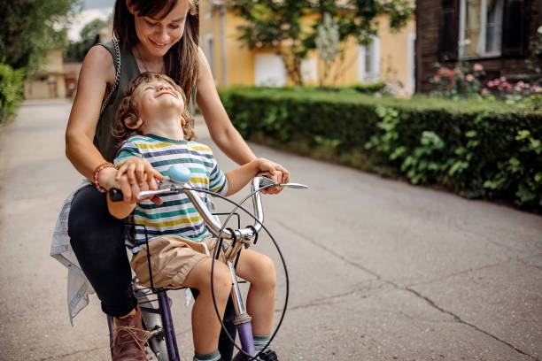istock Son and mother enjoy the ride 1402494764