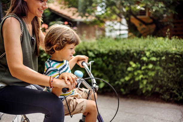 istock Son and mother enjoy the ride 1402494778