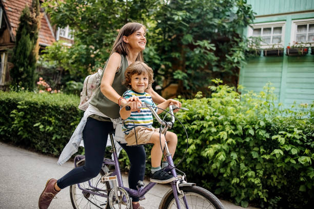 istock Son and mother enjoy the ride 1402495333