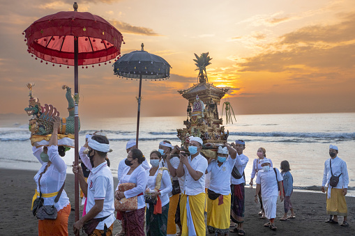Melasti is a self-purification ceremony to welcome the Nyepi day by all Hindus in Bali. On The Melasti ceremony is held to wash away the impurities of nature using the water of life. 27 February  2022 The Melasti ceremony is held on the Maceti beach Bali with the aim of purifying oneself from all bad deeds in the past and throwing them into the sea