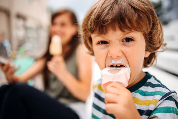 istock Toddler enjoying ice cream 1402496680