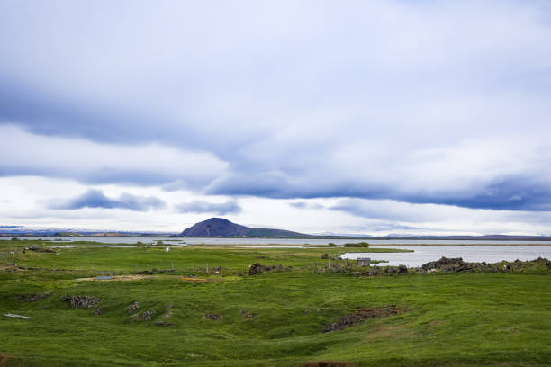 istock Meadows, lakes and mountain ranges Icelandic landscape 1402498627