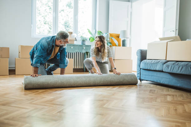 Mature Couple with Moving Boxes in New Home