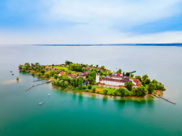 Frauenchiemsee or Frauenworth Abbey aerial panoramic view, it is a Benedictine abbey on the island of Frauenchiemsee in Chiemsee lake, Bavaria in Germany