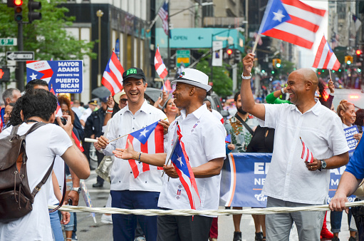 Mayor Eric Adams marches up Fifth Avenue in New York City during the National Puerto Rican Day Parade, returning after a two-year-hiatus due to the pandemic, on June 12, 2022.
