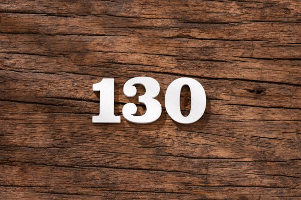 istock Number 130 - piece on rustic wood background 1402511769