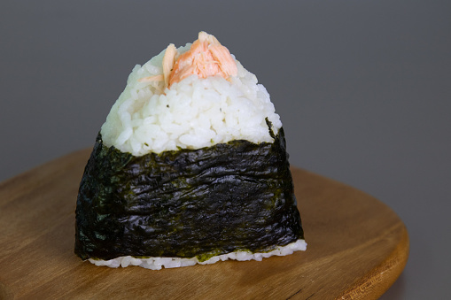 Sushi from Nara, Wrapped in a Delicate Persimmon Leaf\nUsed originally to preserve the freshness of raw fish