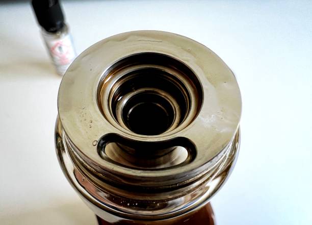 istock An open head of an e-cigarette. ready to refill. 1402516652
