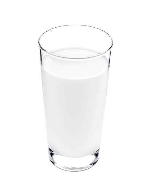 istock Glass of fresh milk isolated on white 1402520185