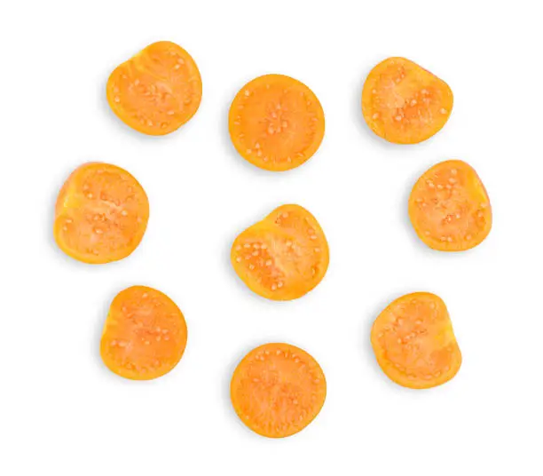 Slices of cape gooseberry (physalis) isolated on white background. Top view