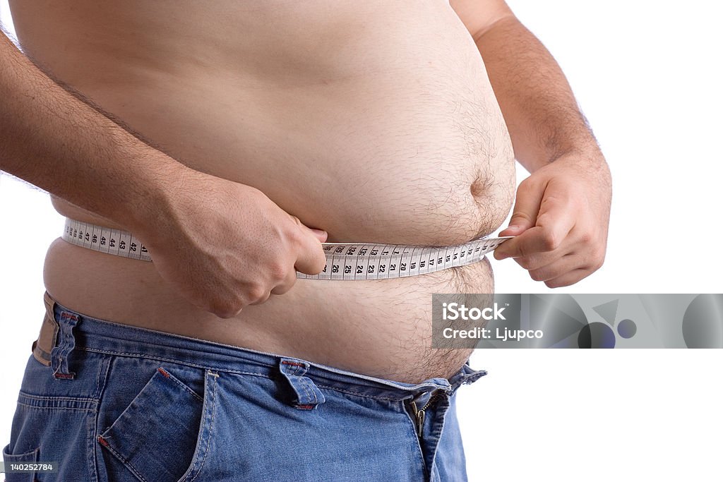 Fat man holding a measurement tape Abdomen Stock Photo