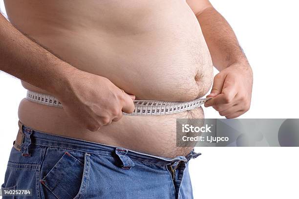 Fat Man Holding A Measurement Tape Stock Photo - Download Image Now - Abdomen, Adult, Adults Only