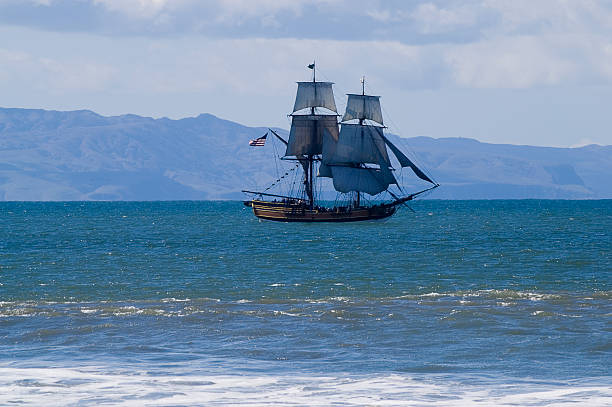 istock Sailing Vessel With Island in Background 140252920