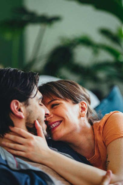 istock Smiling Couple Enjoying Spending Time Together At Home 1402529451