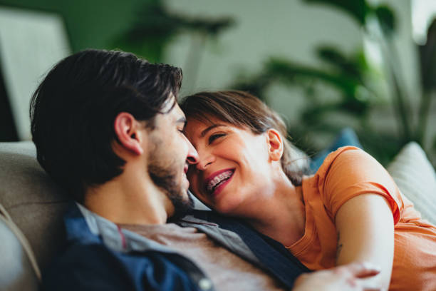 istock Cheerful Couple Enjoying Spending Time Together At Home 1402529454