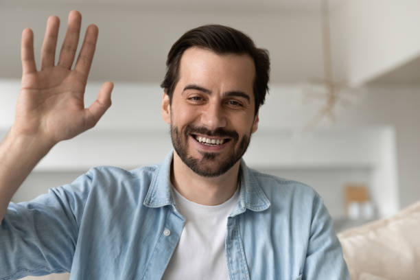 istock Happy millennial handsome man holding video call meeting. 1402531919