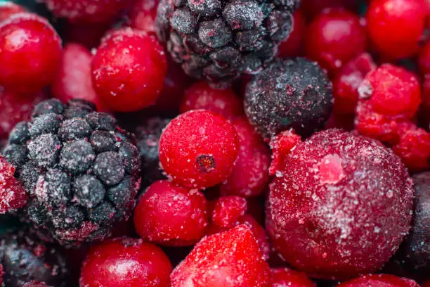 Close up of frozen mixed berries. healthy lifestyle. top view. macro.