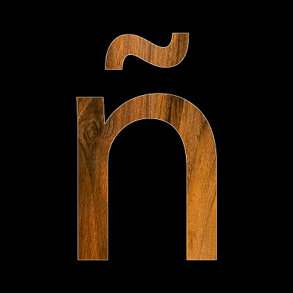 Letter ñ in wood texture - black background