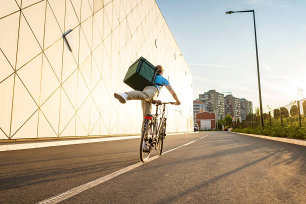 istock Delivery man with bicycle, delivery service. 1402535443