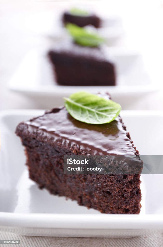 chocolate cake slices of chocolate cake, focus on texture in front Chocolate Pie Stock Photo