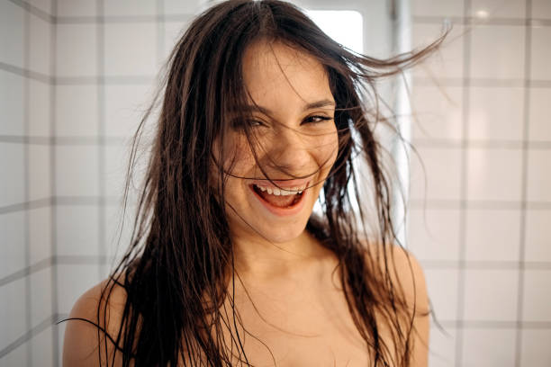istock Beauty is using hairdryer 1402537362