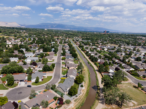 Aerial View of Dry Weather in the Desert Area of Western Colorado, Single Family Neighborhood with Partly Sunny Skies and Clouds