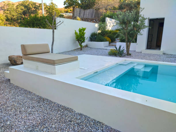istock Sofa near Pool with blue water 1402541201