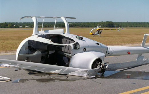 an airplane tail in a plane crash site