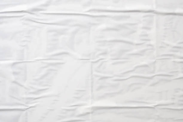 istock white crumpled and creased paper poster texture background 1402545675