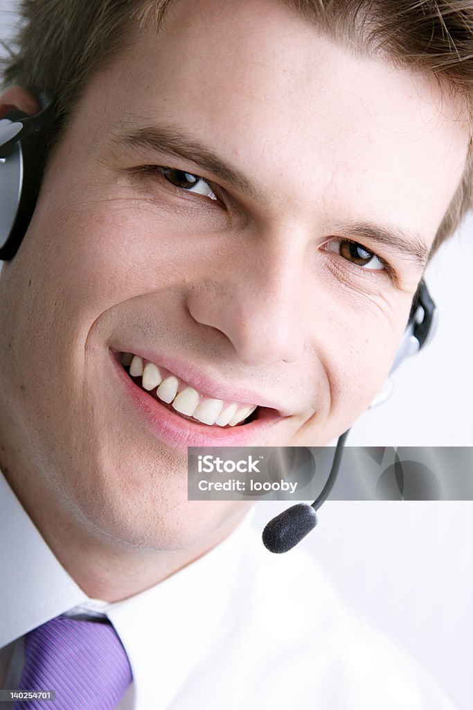 helpful operatore young, handsome,smiling operator Adult Stock Photo