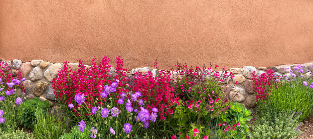 Santa Fe Style: Stone and Adobe Wall, Summer Flowerbed Wide Angle